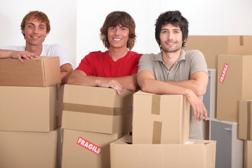 Careful wrapping of fragile belongings during a local house move