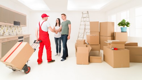 Loading household furniture into a van in Croydon