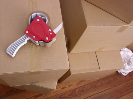 Local removals crew handling furniture for a Croydon residential move