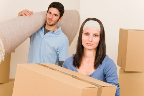 Commercial removals team moving office furniture in Croydon