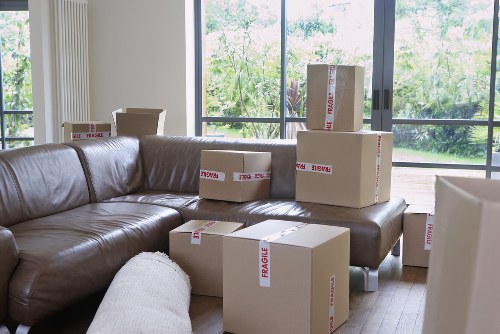 Packed boxes and moving equipment ready for transport
