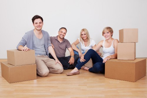 Van and moving crew at a property during a relocation